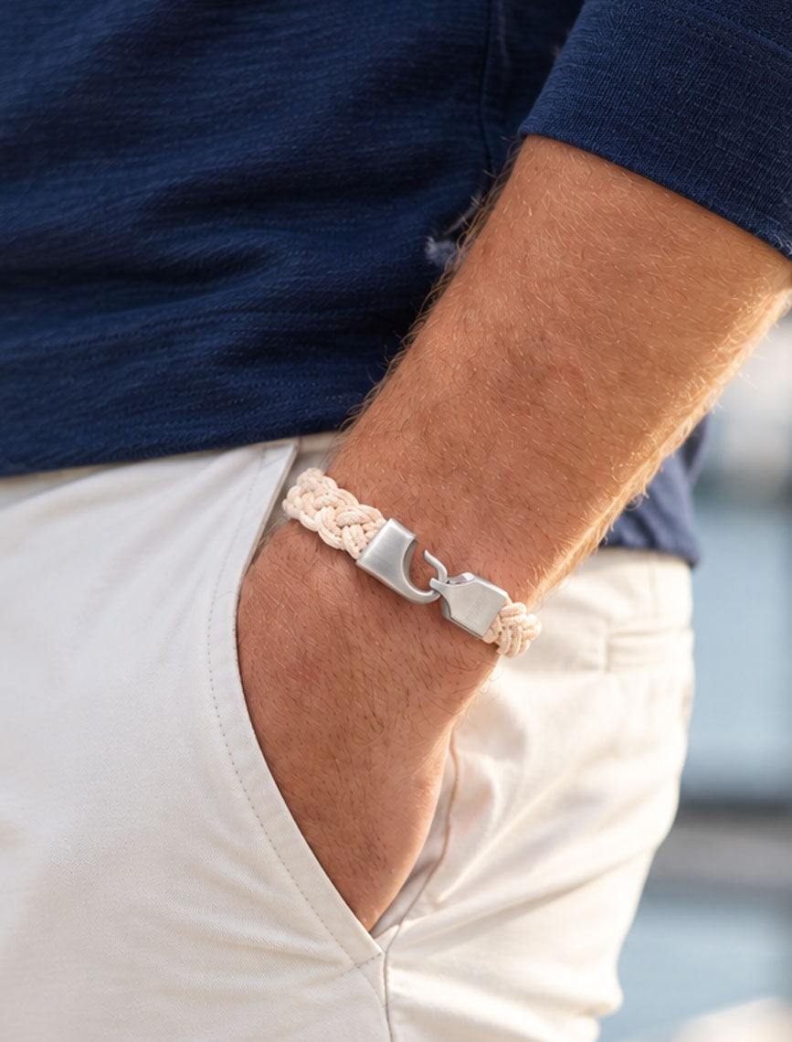 Man wearing a Lemon and Line Turks Head rope bracelet
