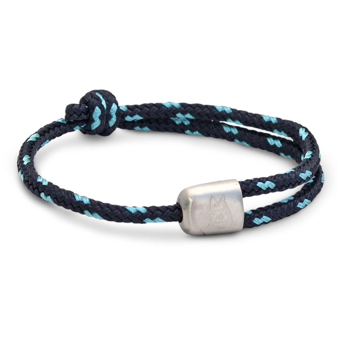 The Cuttyhunk Collection: An adjustable navy and sky blue nautical rope bracelet in custom USA-made double braid line with 316L stainless steel hardware.