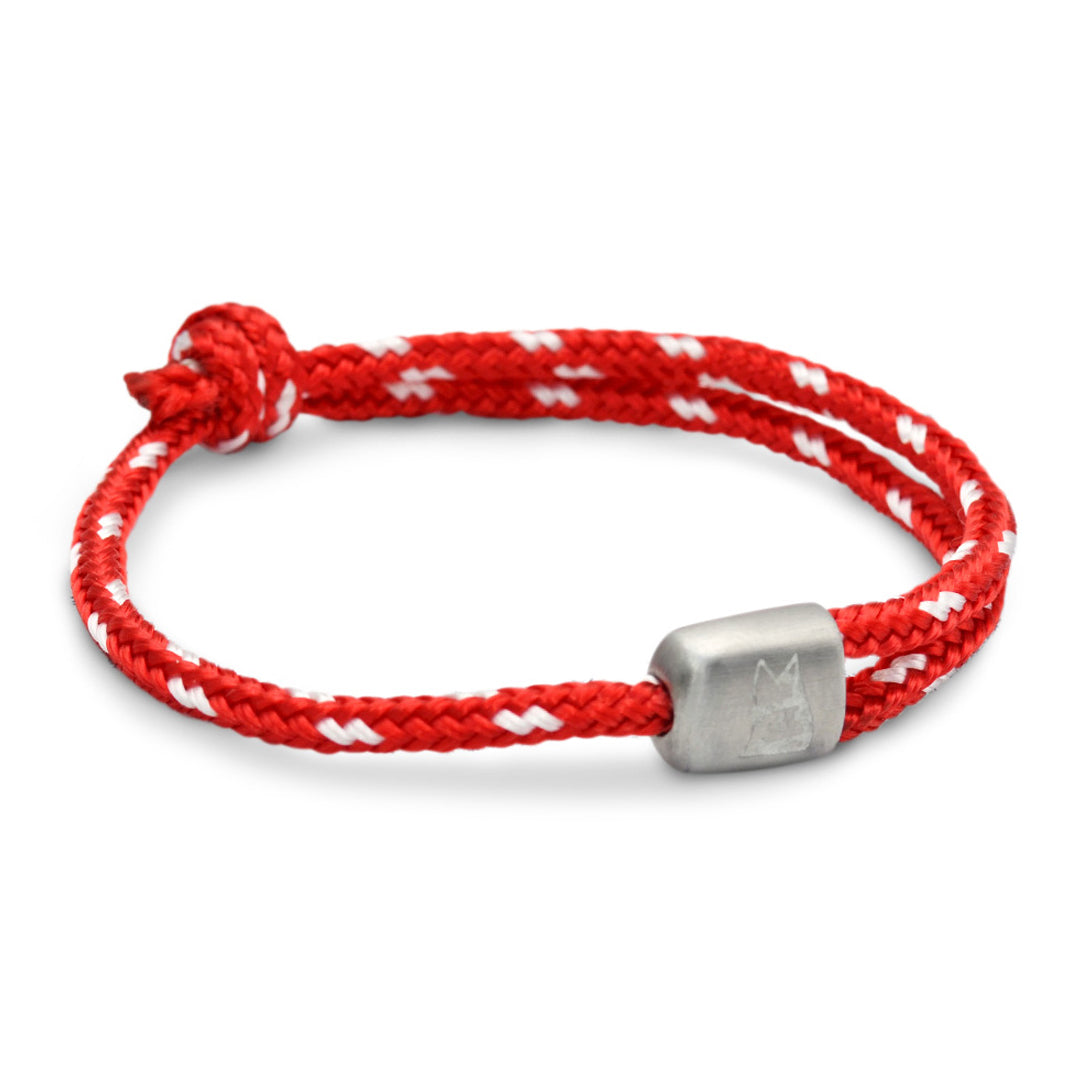 The Cuttyhunk Collection: An adjustable red and white nautical rope bracelet in custom USA-made double braid line with 316L stainless steel hardware.