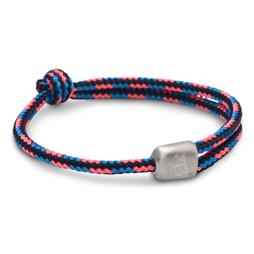 The Cuttyhunk Collection: An adjustable navy, coral and Atlantic blue nautical rope bracelet in custom USA-made double braid line with 316L stainless steel hardware.