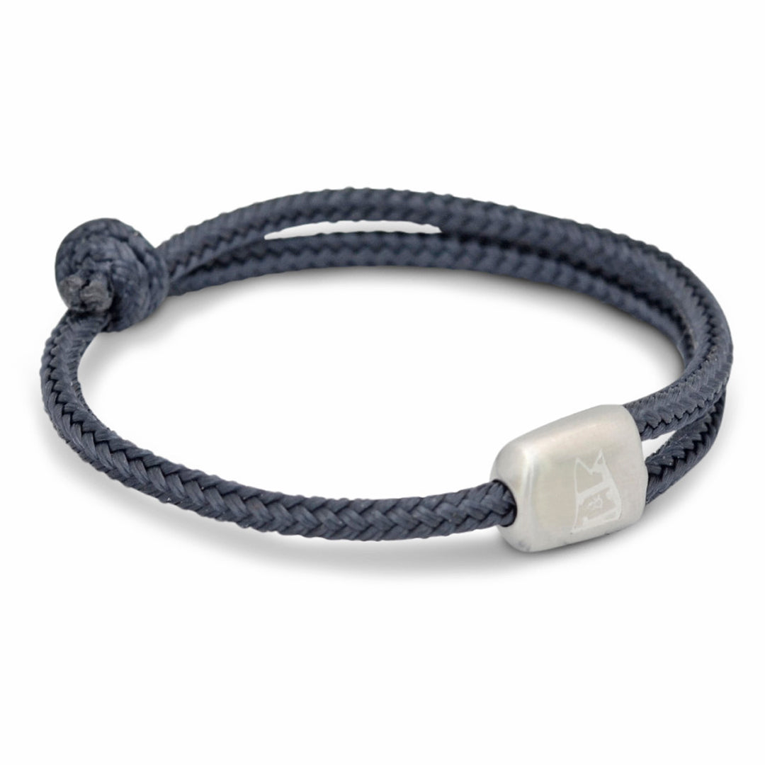 The Cuttyhunk Collection: An adjustable navy nautical rope bracelet in custom USA-made double braid line with 316L stainless steel hardware.