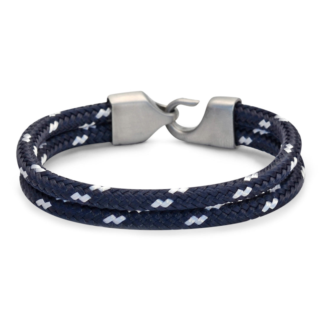 The Newport Collection: A navy blue and white double braid hitch nautical rope bracelet featuring a 316L stainless steel clasp and custom USA-made line.