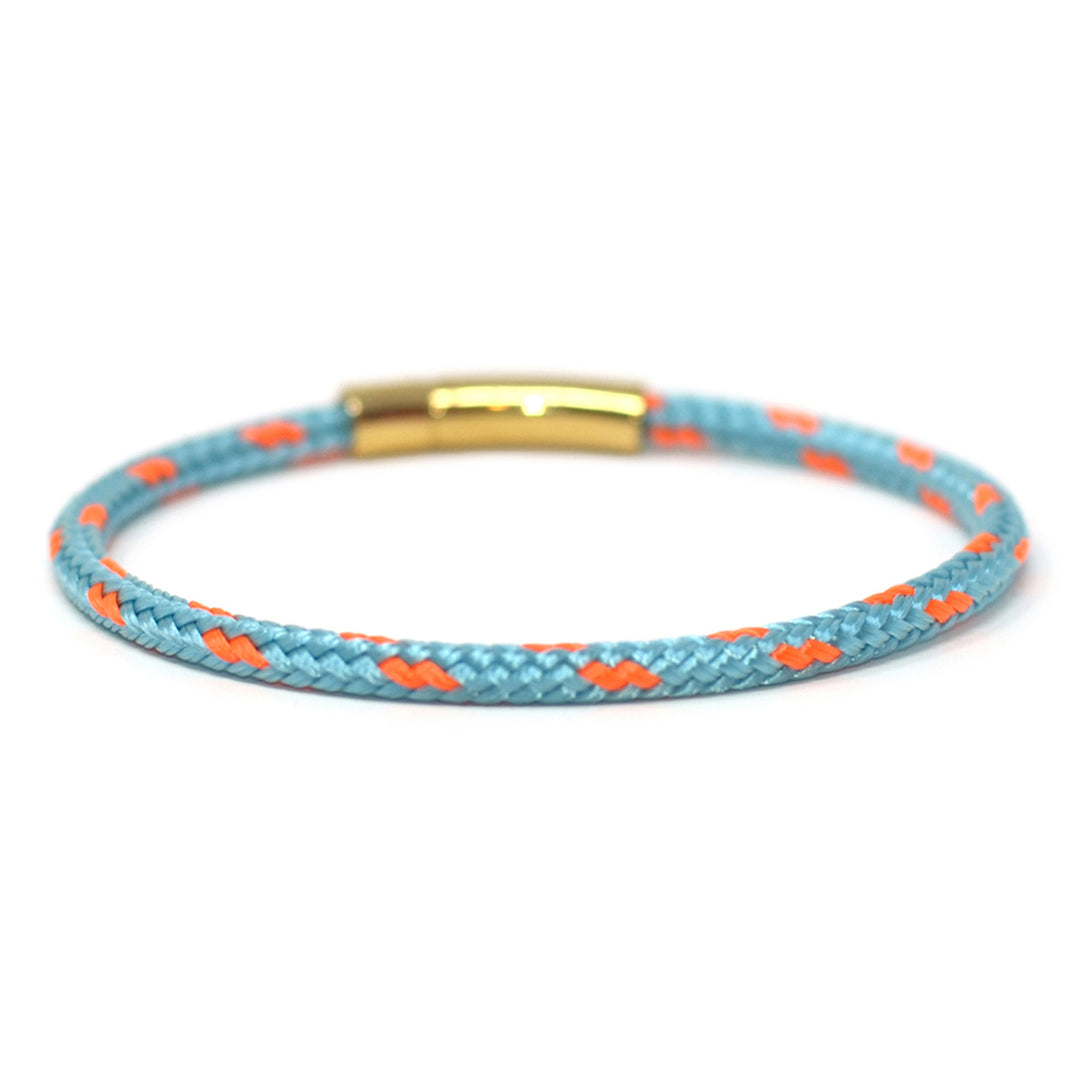 The Chatham Collection: A streamlined light blue and orange nautical bracelet handcrafted with custom USA-made line and 316L gold stainless steel hardware by Lemon & Line.