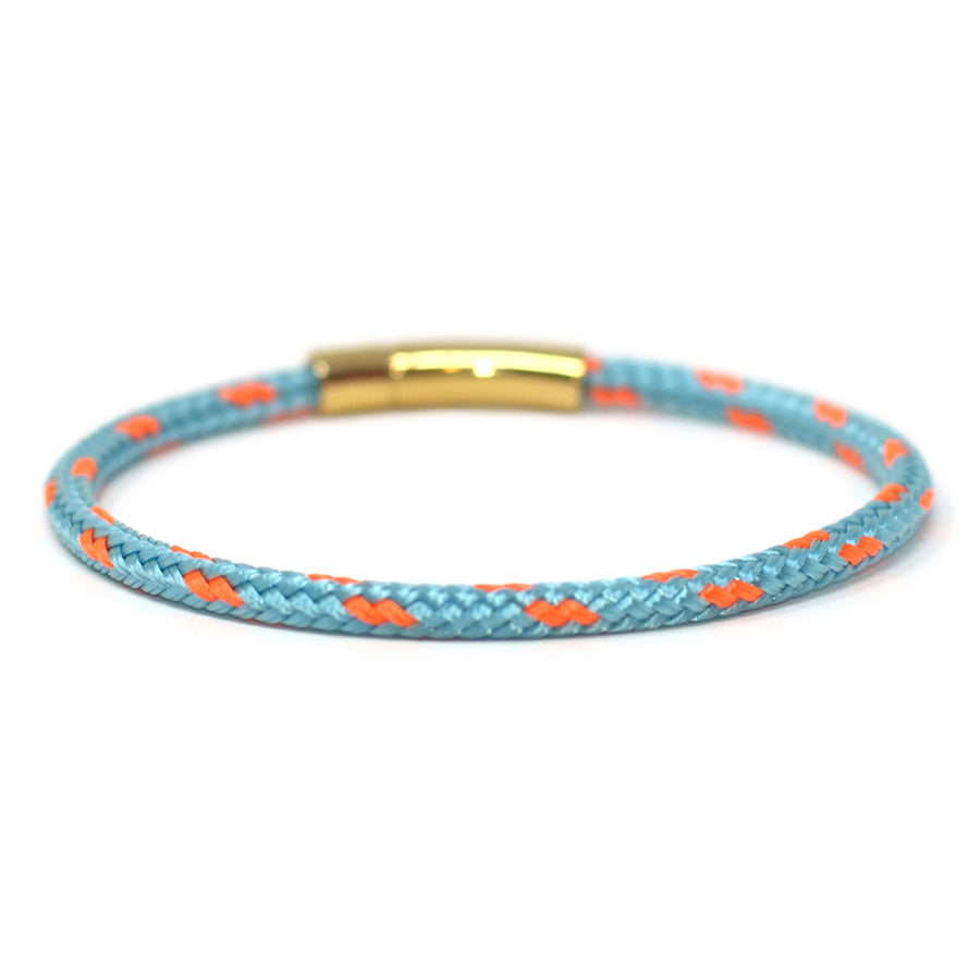 The Chatham Collection: A streamlined light blue and orange nautical bracelet handcrafted with custom USA-made line and 316L gold stainless steel hardware by Lemon & Line.