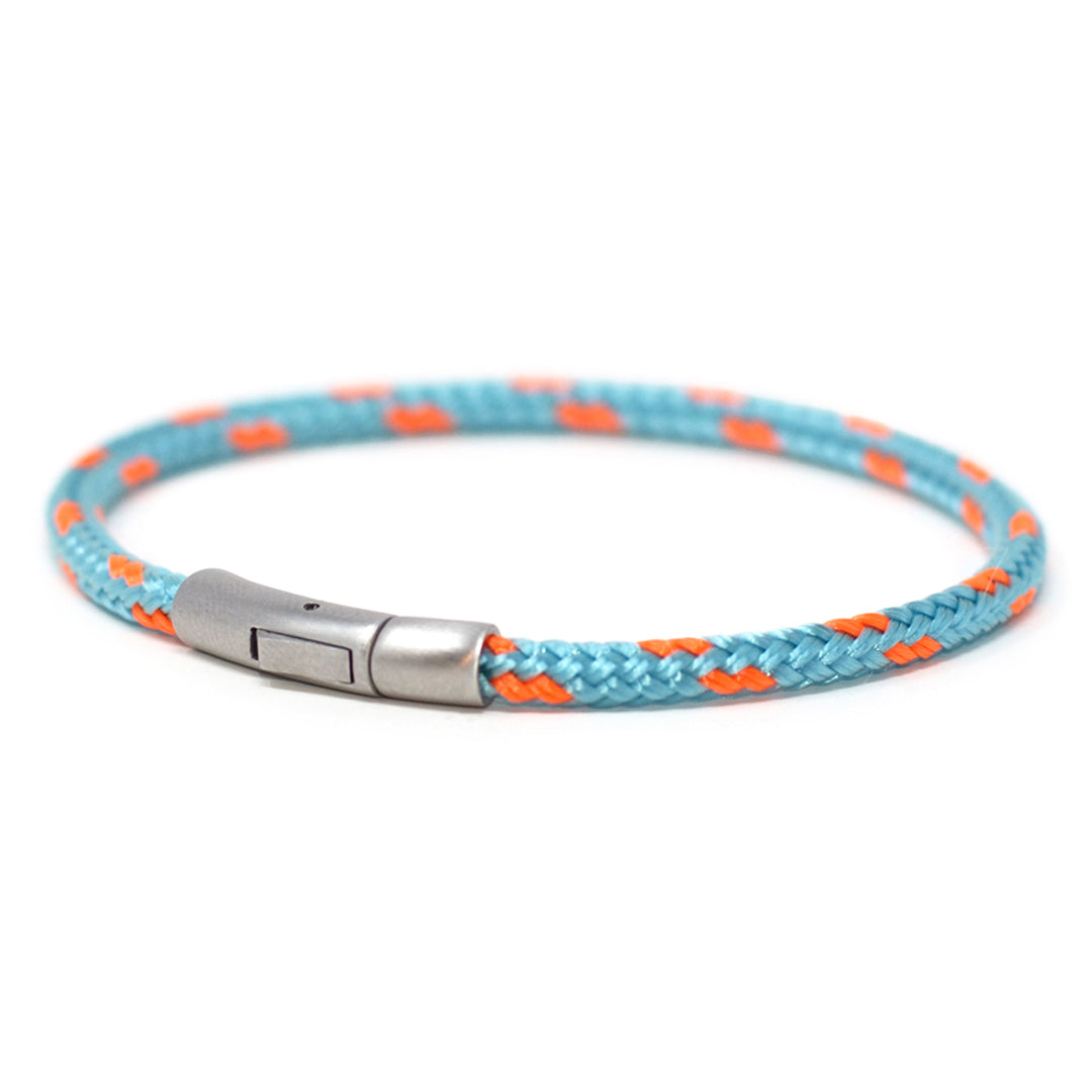 The Chatham Collection: Our streamlined light blue and orange nautical rope bracelet featuring a 316L stainless steel clasp and custom USA-made line.