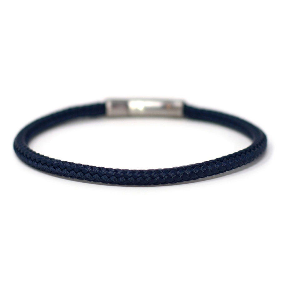 The Chatham Collection: Our streamlined navy blue nautical rope bracelet featuring a 316L stainless steel clasp and custom USA-made line.
