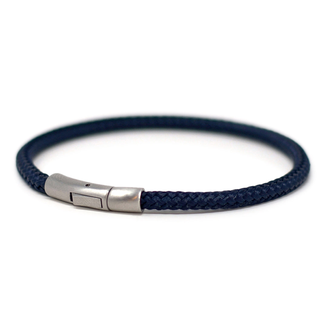 The Chatham Collection: Our streamlined navy blue nautical rope bracelet featuring a 316L stainless steel clasp and custom USA-made line.