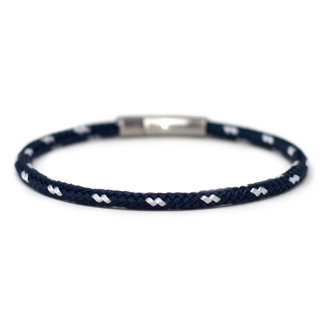 The Chatham Collection: Our streamlined navy blue and white nautical rope bracelet featuring a 316L stainless steel clasp and custom USA-made line.