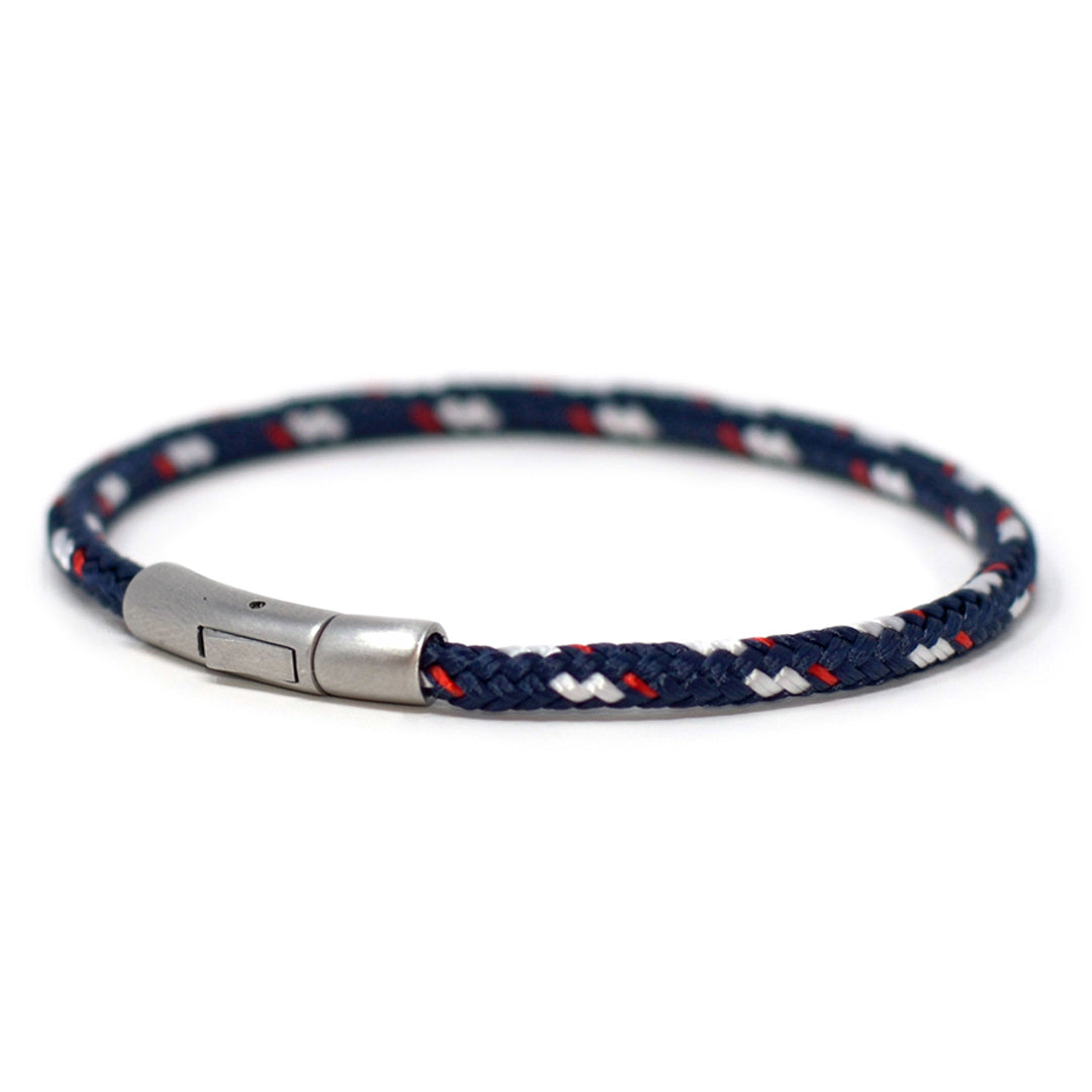 The Chatham Collection: Our streamlined navy blue white and red nautical rope bracelet featuring a 316L stainless steel clasp and custom USA-made line.