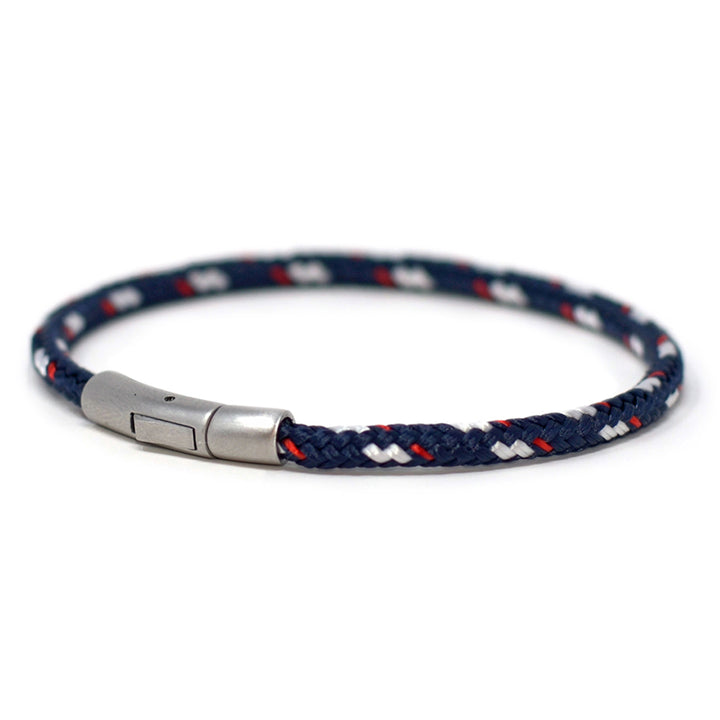 The Chatham Collection: Our streamlined navy blue white and red nautical rope bracelet featuring a 316L stainless steel clasp and custom USA-made line.