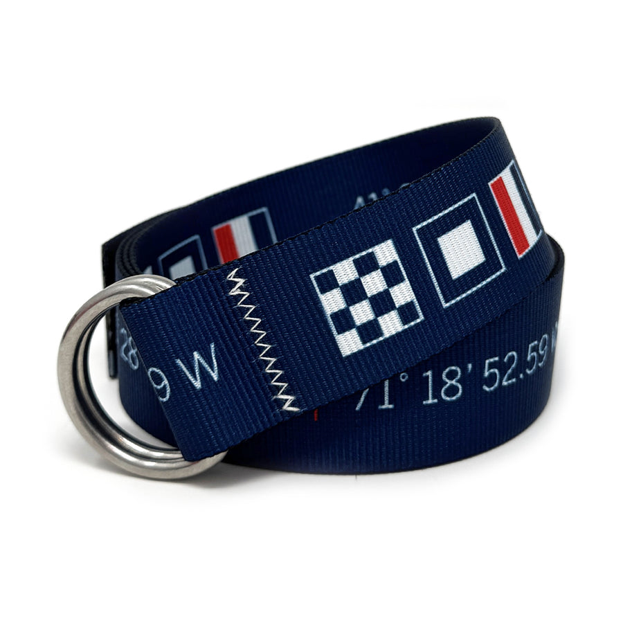 Newport Signal Flag & Lat/Long Belt: A navy blue 1.5" marine-grade webbing belt featuring signature zig-zag stitching and 316L stainless steel d-rings.