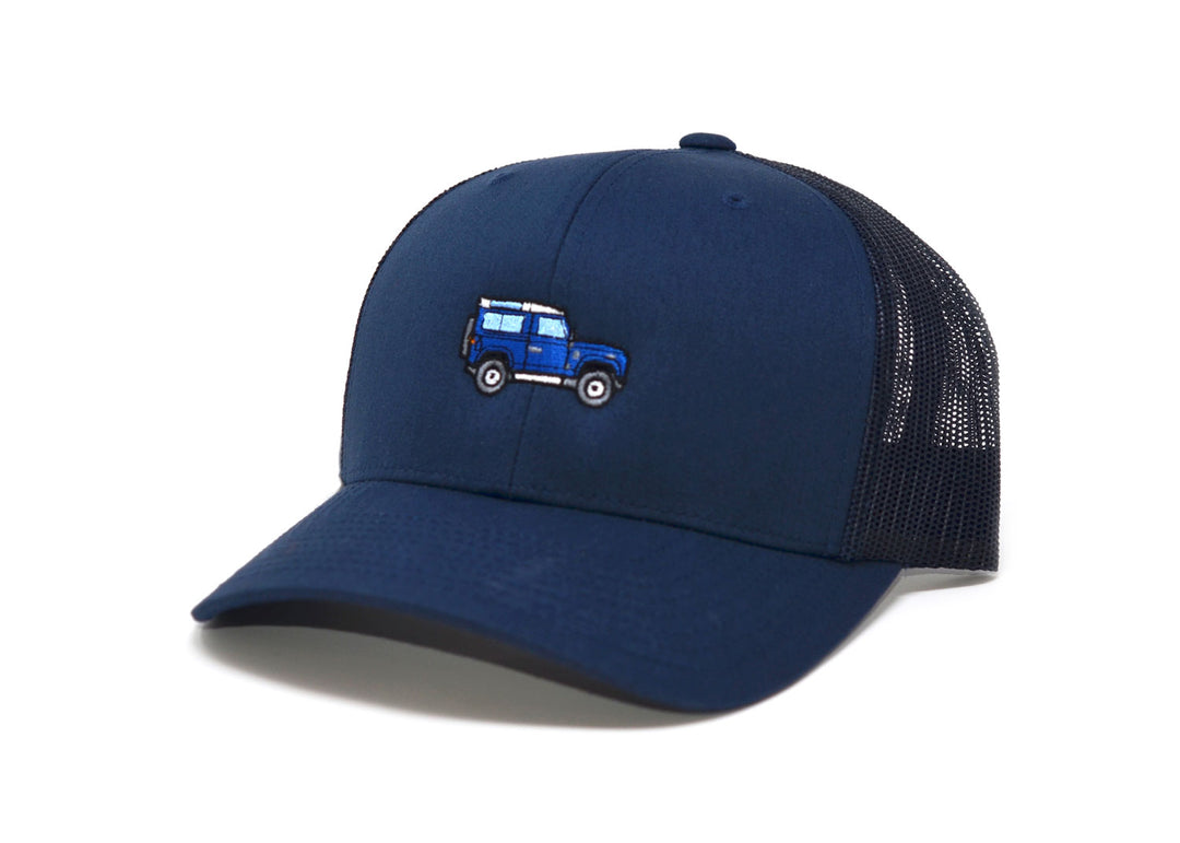 Land Rover D90 Trucker Hat: A navy 6-panel structured mesh back hat with a mid-profile fit and snapback closure.